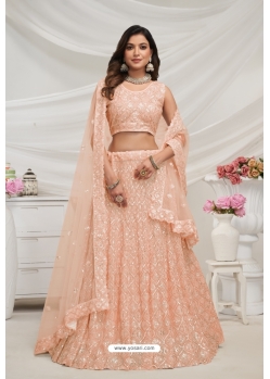 Light Orange Soft Net Sequins And Stone Embroidered Lehenga Choli