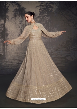 Beige Heavy Stylish Embroidered Lucknowi Gowns With Tassels