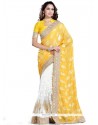 Fascinating Yellow And Off White Patch Border Work Designer Saree