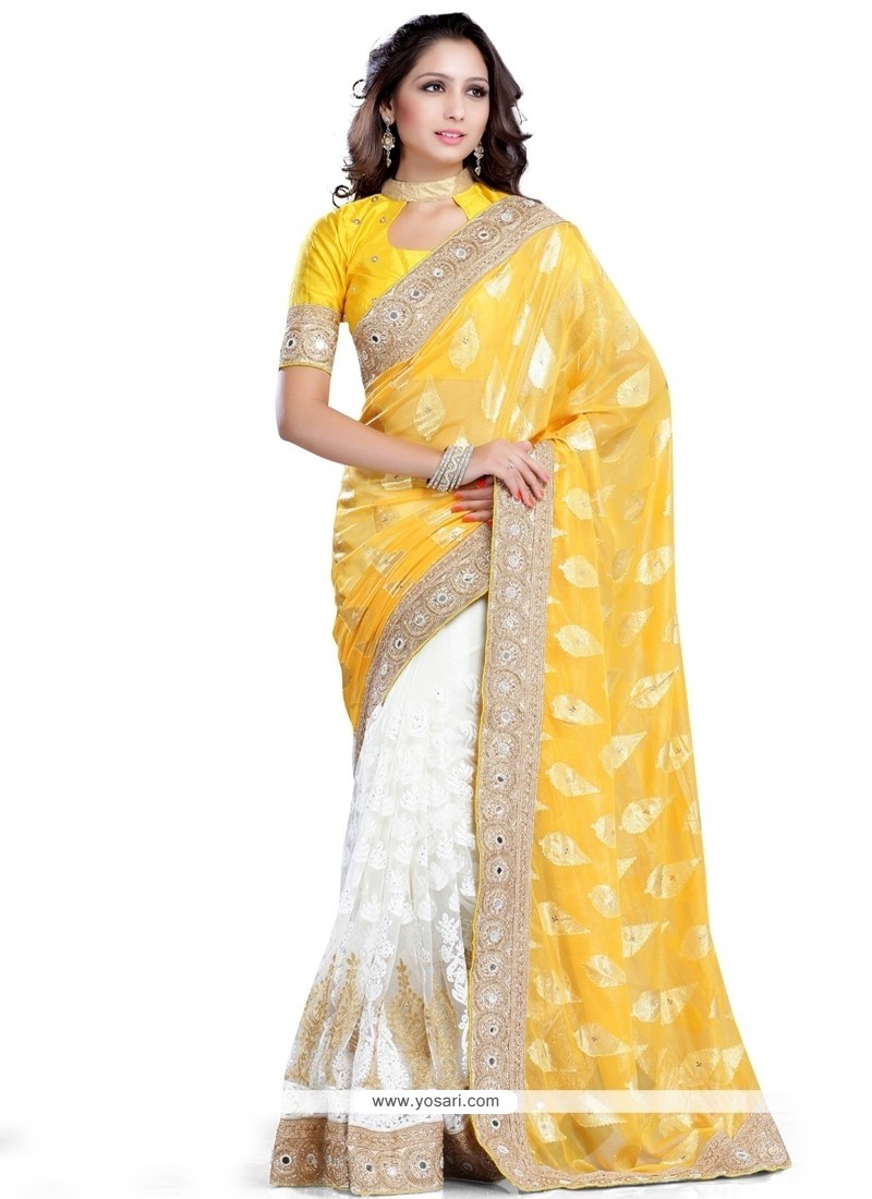 Fascinating Yellow And Off White Patch Border Work Designer Saree